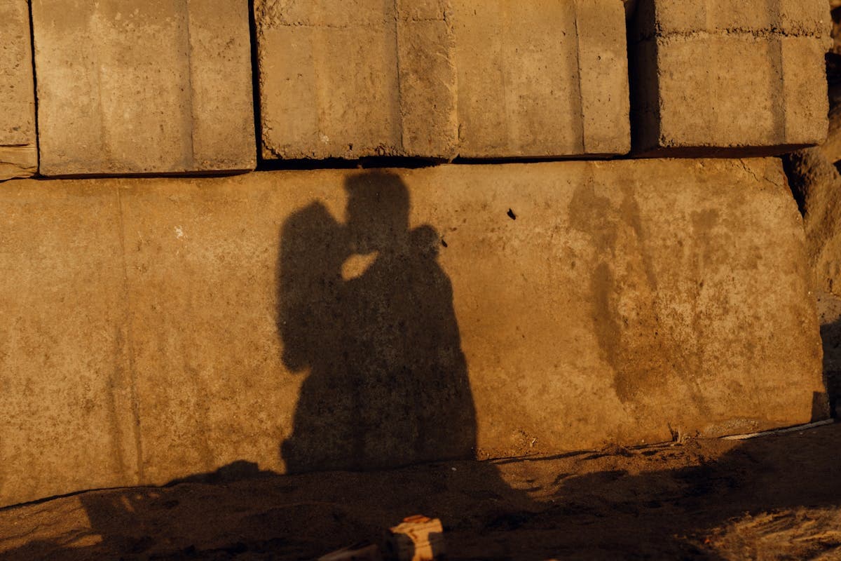 Shadow of a couple on a wall – closeness and intimacy